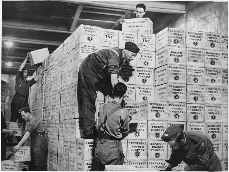 File:Cases of TNT gunpowder shipped from the USA under lend-lease are stacked in the dump in a tunnel 100 feet underground... - NARA - 196328.jpg