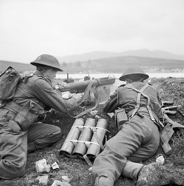 File:A PIAT (Projectile Infantry Anti-Tank) in action at a firing range in Tunisia, 19 February 1943. NA756.jpg