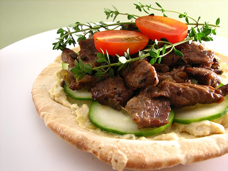 File:Pita topped with artichoke hummus and lamb.jpg