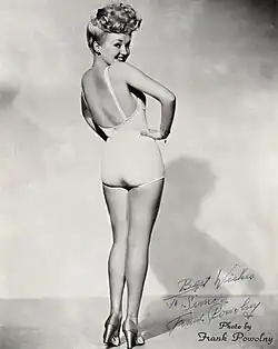 L'actriz, cantaire y bailarina estausunidense Betty Grable, en una imachen de 1943 que la fació muit conoixita entre os soldatos de l'Exercito estausunidense mientres d'a Segunda Guerra Mundial.