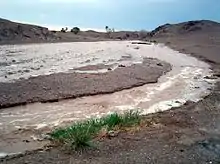 L'augua burenca d'una barrancada.