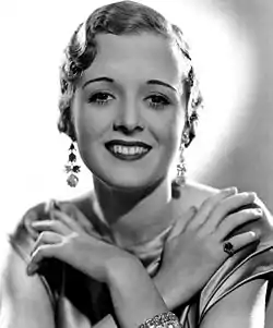 Imachen publicitaria de l'actriz Mary Astor ta promocionar a cinta Convention City (1933).