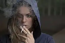 An example of fashion photography involving cigarettes.