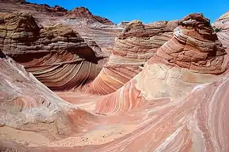 A photo of the wave on a sunny summer day