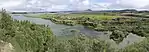 Mývatn lake, surrounded by lush vegetation