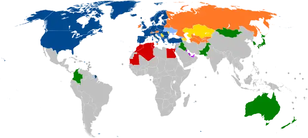 A world map with countries in blue, cyan, orange, yellow, purple, and green, based on their NATO affiliation.