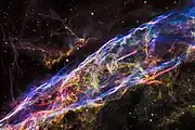 Veil Nebula observed by مرصد هابل الفضائي.