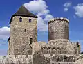 ŢáÚÉ ČíĎŇÇíä (Będzin Castle) عام 1348، طورها الملك وحولها من حصن خشبي إلى حصن من الحجارة