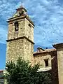 Detalle de la torre-campanariu de la parroquial de Puebla de San Miguel (Valencia), añu 2004.