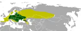 Distribución del bisonte européu a empiezos del holocenu (verde claru), la Edá Media (verde escuru), y sieglos XX y XXI (colloráu)