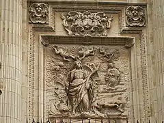 Puerta del cleru, relieve de santa Catalina por Lucas González.