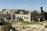 Ruins of a stone church without roof.