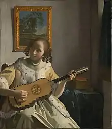 Gitara çalan (1672), rəssamı: Yohans Vermir (Johannes Vermeer).