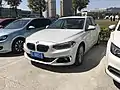 Седан BMW 1 серыі спераду.