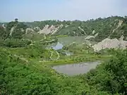 Verwitterungszonen und Badlands im Niupu-Naturlehrpark