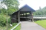 Alte Holzbrücke und die 2000 neu errichtete Stahlbeton-Brücke über den Necker