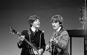 Paul McCartney und George Harrison, 1964