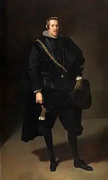 Diego Velázquez: Don Carlos, Infant von Spanien, 1628. In Spanien kommt in der Spätphase unter Philipp IV. ein einfacher tellerförmiger Stehkragen (Golilla) auf, als Ersatz für die Halskrause, das Haar wird etwas länger. Der Infant trägt auch eine knielange wattierte Pumphose.