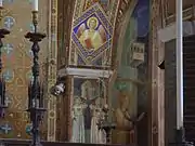 Zwei Engel tragen das Heilige Haus, Fresko in der Kirche San Marco in Jesi bei Ancona (um 1350) – Bild a)