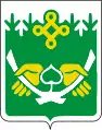 „Totemzeichen“ „als Symbol der uralten Kultur der Region“ im Wappen von Kostomukscha (Karelien)