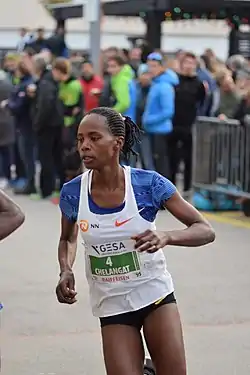 Sarah ChelangatRang zehn in 15:19,90 min