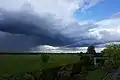 Cumulonimbus arcus über Panketal mit schöner Böenfront und Starkniederschlag beim linken Bildrand