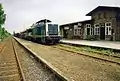 Güterzug mit Wagen für die Autoverladung Ehlenbruch im Bahnhof Helpup, 1992