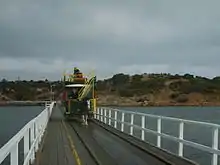 Pferdewagen auf der Seebrücke nach Granite Island