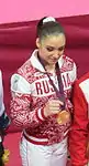 Alija Mustafina gewinnt Silber mit der russischen Mannschaft