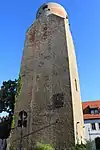 Lubwartturm mit Sonnenuhr im verputzten Zustand vor der Sanierung 2010