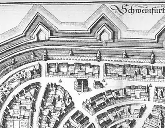 Stadtplan von M. Merian.Links Zeughaus, rechts Kilianskapelle.1656