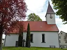 Verputzter Fachwerk-Dachturm der Dorfkirche Kohlstetten