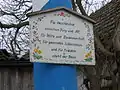 Ein Sinnspruch am Maibaum in Maxweiler