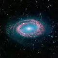 Die Galaxie NGC 4725 aufgenommen vom Spitzer-Weltraumteleskop im infraroten Licht