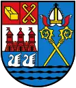 Wappen von Kołobrzeg (Kolberg), im ersten Feld eine Siedepfanne, im zweiten die Pfannhaken