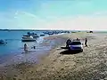 Strand von La Patache. Im Hintergrund Boote der Austernzüchter