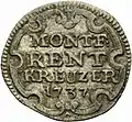 Rentkreuzer von 1737. Beschriftung: "MONTF: / RENT / KREUZER / 1737" in Kartusche.