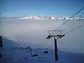 Nebelmeer unter Piz Martegnas. Im Hintergrund die Bergüner Stöcke mit Piz Mitgel, Tinzenhorn und Piz Ela