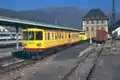 Triebwagengarnitur mit Aussichtswagen im Bahnhof Latour-de-Carol - Enveitg