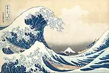 In dem Farbholzschnitt Die große Welle von Kanagawa von Katsushika Hokusai von 1830–1832 bilden große Wellen einen bedrohlichen Rahmen für den (im Moment) stabil ruhenden Schichtvulkan Fudschijama im Hintergrund. Der Kontrast verdeutlicht die Bedrohung der Menschen durch die Naturgewalten.