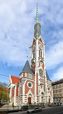 Lutherkirche mit Pfarrhof und zwei Wohnhäusern