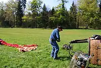 Pretigado de la balono por la starto