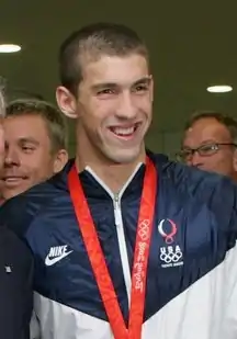 مایکل فلپس شناگر امریکایی صاحب ۲۸ مدال المپیک (بیشترین مدال در تاریخ المپیک)، از جمله ۲۳ طلا و ۴ رکورد جهانی در این ورزش