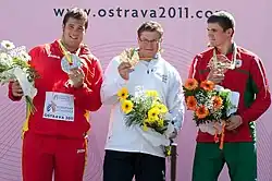 Paweł Fajdek (kesk.) alle 23-v. EM-kisoissa 2011.