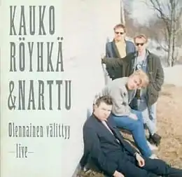 Livealbumin Olennainen välittyy kansikuva