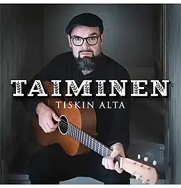 Studioalbumin Tiskin alta kansikuva