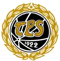 TPS:n logo 1990–2007. ”Pallologon” ympärille lisättiin kultalehvät sen jälkeen, kun joukkue oli voittanut toisen peräkkäisen Suomen-mestaruuden.