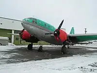 Curtiss C-46 „Buffalo Joe“ fan Buffalo Airways yn it noarden fan Kanada, om 2005