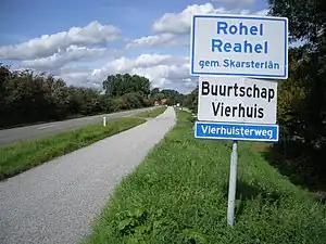 Boerd by Fjouwerhûs, dat ûnder Reahel falt.