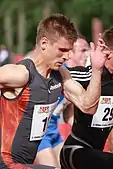 Marcin JędrusińskiRang acht in 20,99 s